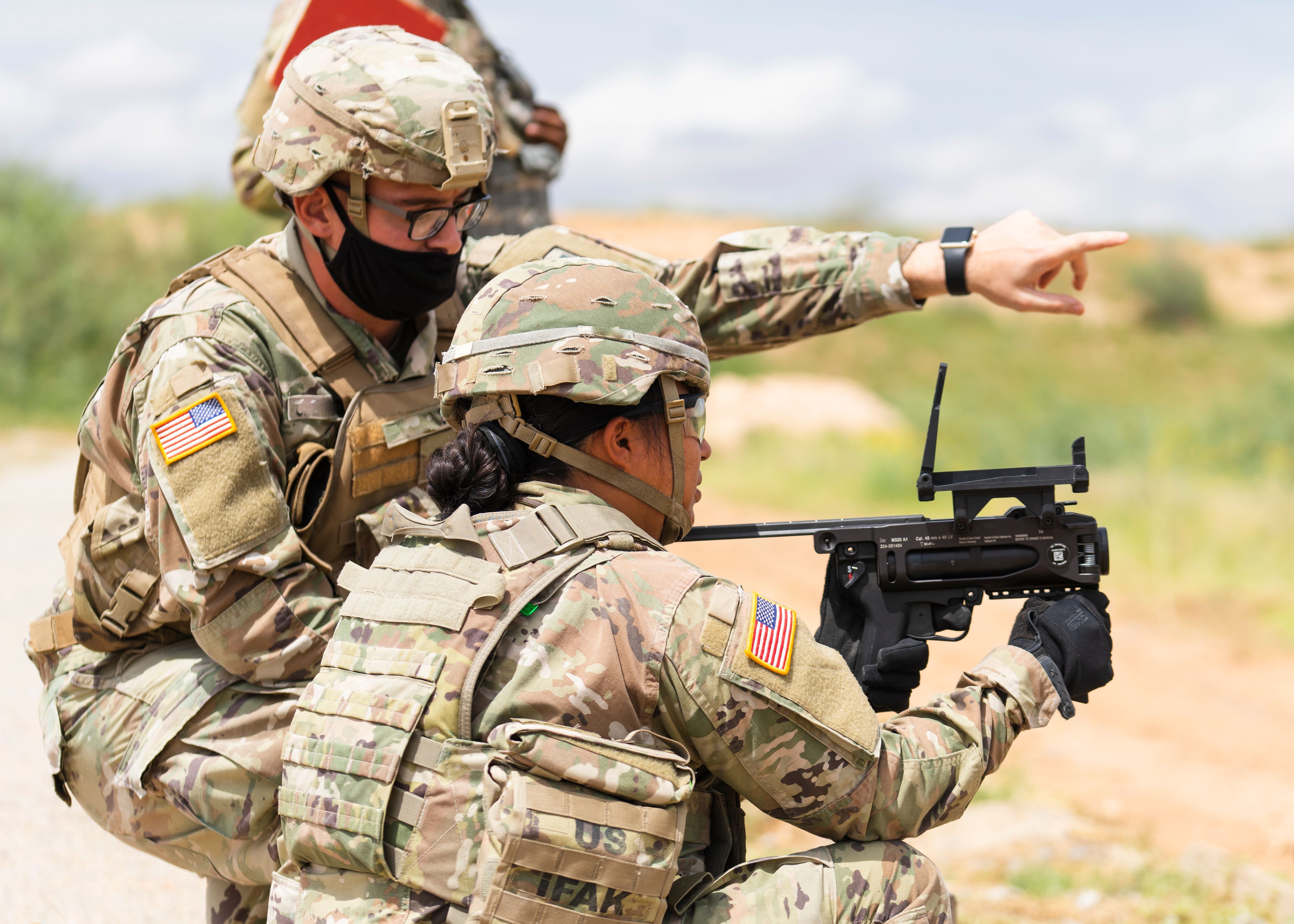 U.S. service members training in the field