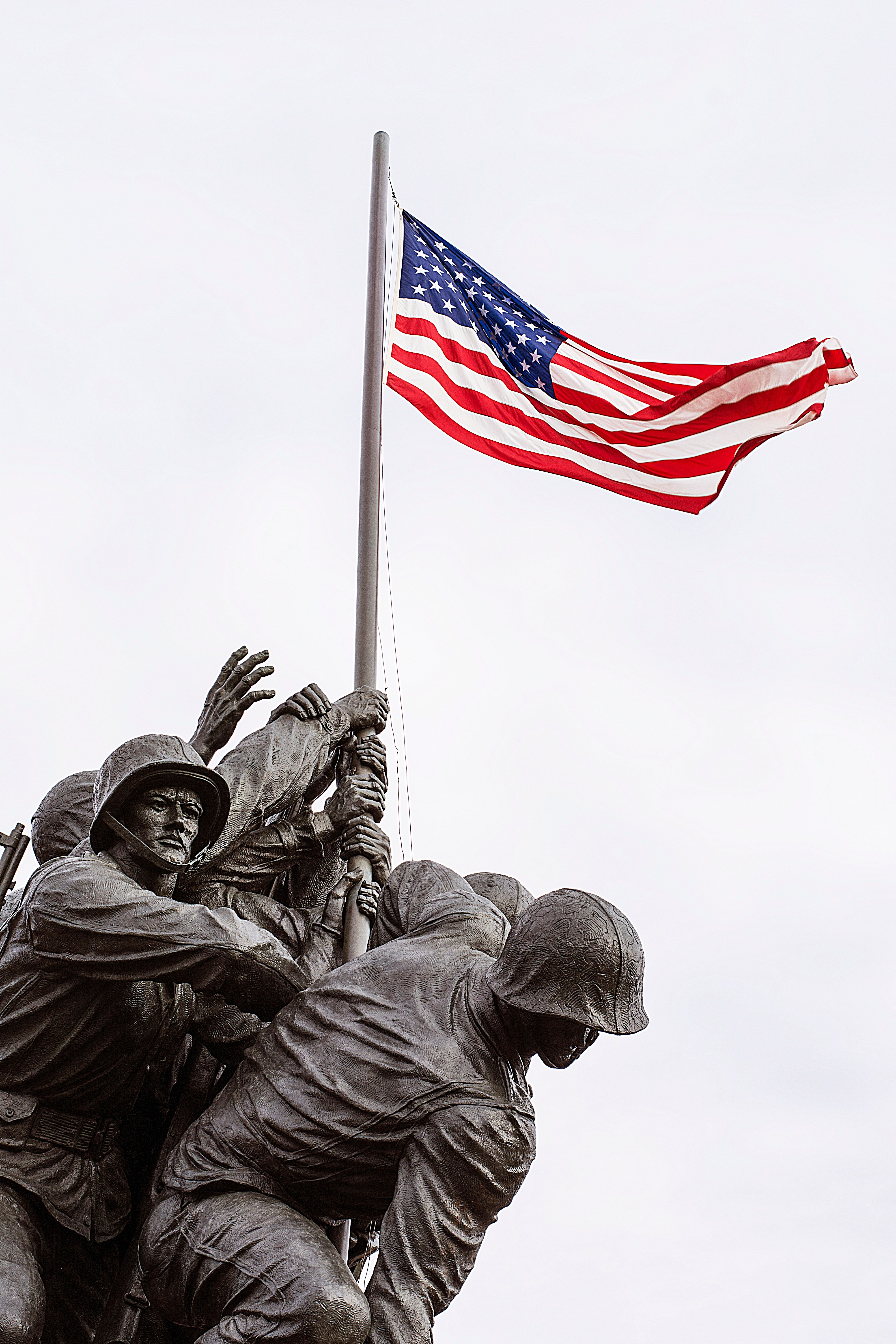 American flag and military memorial representing veteran hearing support